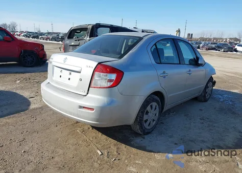 2010 Suzuki Sx4 Le/Le Popular z USA, uszkodzony, nr VIN JS2YC5A29A6300874